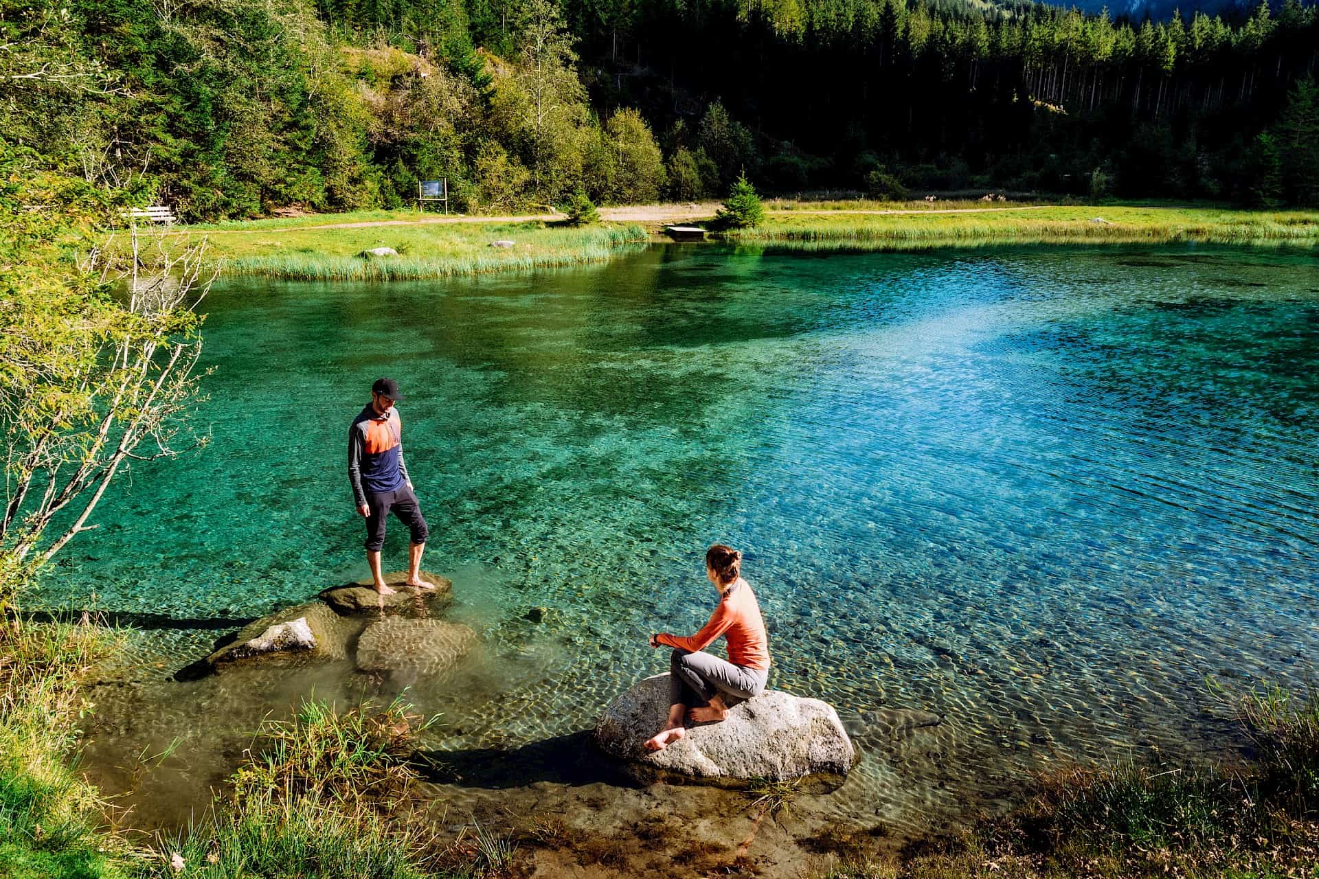 Relaxing at the turquoise Blausee in Neukirchen – crystal-clear water, natural serenity, and refreshment after a hike.